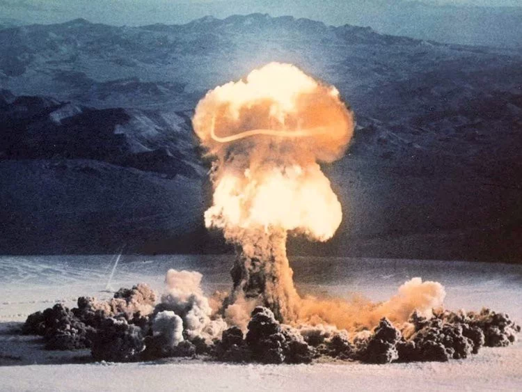 Dangers of Exponential Growth: Viruses and Atomic Bombs